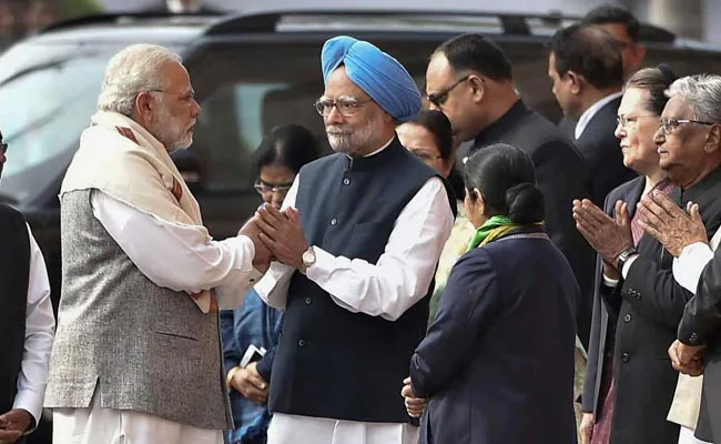 pm modi manmohan singh handshake